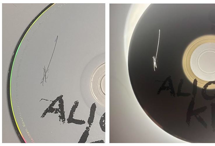 Photo of scratch on label side of a CD